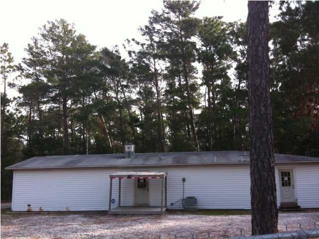 This property consists of a 1,500 Sq/ft building that was formerly used as a workshop an is situated on an fenced in acre of land that has been equipped with a large security system.