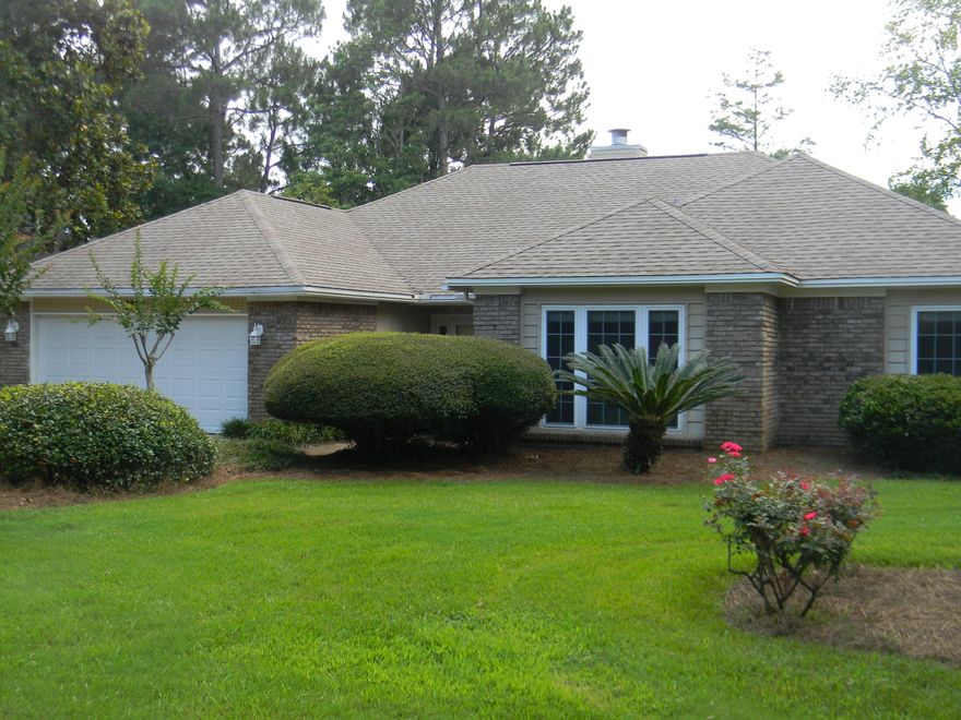 Well-maintained 4 bedroom 2.5 bath brick home which opens up to the formal living room. All interior walls and trim just painted. All new storm windows 2009, 2010 new garage door, and metal storm shutters, new tile 2012 kitchen and baths. The formal dining room overlooks the golf course (3rd tee of the Bay Course. Great kitchen with a g.c. view, recessed ceiling lighting, walk-in pantry. The bay window eating area is glass-wrapped for a great view. Kitchen appliances recent. Spacious family room which has a fireplace and built-in bookshelves! Master bedroom has two closets and a large master bath with tub and separate shower and skylights to for natural light. Central vac, termite bond, home warranty in place. BlueWater Bay boasts pools, tennis, golf course, walking trails and marina area. Roof replaced approximately 2005 with GAF shingles and chimney replaced with hardi board 2016.  Also, AC/heating units replaced around 2006. Seller has installed over $7000 in landscaping in the front and back yard.  Underground utilities, great schools, Super close to beaches via mid bay bridge, shopping, dining and entertainment, while easy acess to Eglin AFB and Duke Field.