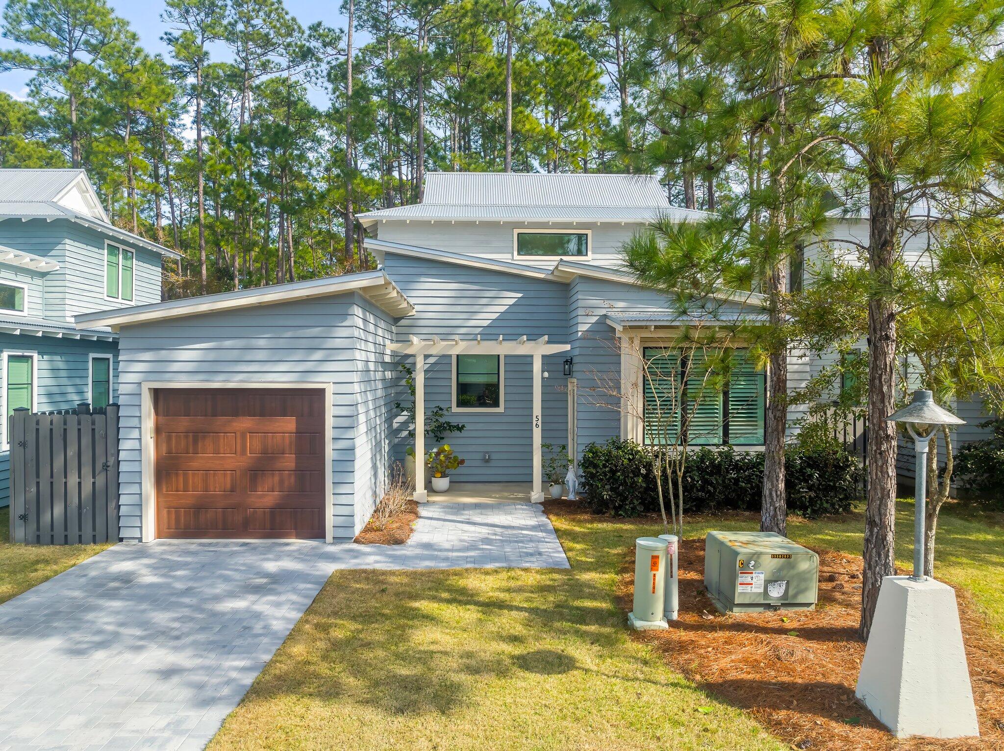 Welcome to 56 Edens Landing Cir in beautiful Santa Rosa Beach, FL! This home offers a comfortable and inviting living space with 3 bedrooms, 2.5 bathrooms complete with modern/chic fixtures and many custom features! Custom woodwork throughout including shiplap accent walls, wood shelving, faux modern fireplace and more!Nicely situated on a fenced lot backing up to the peaceful Eden State Park complete with pavers and potting station. Enjoy the convenience of a community pool, perfect for cooling off on those warm summer days. Nature enthusiasts will appreciate the proximity to Edens State Park, where you can explore the natural beauty of the area. Seagrove public beach access a few miles south and Seaside and surrounding areas close by! Don't miss out on this opportunity to make this house your home!

Unfurnished. Security system available to use. Initial set up and charges may apply.
High speed fiber internet (1 Gbps) provided through HOA. LESSEE agrees to pay additional $50/month

The Beach Sunsets Inc. Resident Benefits Package is designed to provide convenience and professional services to our residents. By applying, Resident(s) agree to be auto-enrolled in the program and pay an additional $25.00 each month, payable with rent. Benefits of this package may vary due to the property specifications. No discount will be given if an element of the package is not available. The cost of this package is all-inclusive.