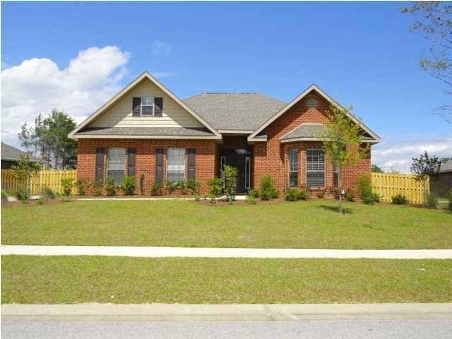 This gorgeous home is located in the Gardens Neighborhood at Hammock Bay. Home features split bedroom plan, Formal Dinning and a bright Sunroom off of master bedroom, granite countertops in the kitchen and bath rooms. The kitchen has beautiful cabinetry, stainless steel appliances. The home comes with a side entry Double Car garage, low maintenance 4 sided brick exterior, 9' ceilings, Irrigation System with well, Ceramic Tile in all of the wet areas. Crown Molding in the foyer, dining room and master bedroom. Rain Gutter and custom Blinds though out. HOA Fees includes Basic Cable. Hammock Bay is located in a Community District Development to ensure the highest quality of infrastructure for years to come! Seller is willing to pay $5,000 Closing Costs.