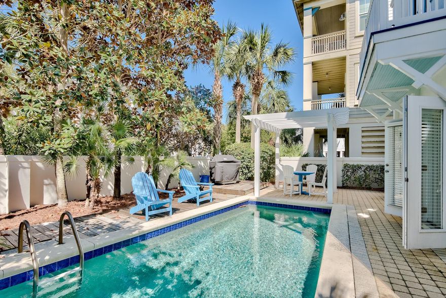 This custom built home blends an exquisite combination of architectural & interior design. Located in the gated island community of Destin Pointe, this four bedroom home maximizes all four stories of living space and affords views of the gulf, coastal dune lake and Destin's East Pass. The property features a private courtyard pool, raised ceilings, library/office and hand painted tile, etched glass & wood flooring throughout including locally sourced one hundred year old heart pine floors & custom mahogany cabinetry as well as sinker-cypress interior doors. The first floor includes a separate bedroom with its own private entry and ensuite bathroom that is perfect for out of town guests or large family gatherings. The main floor is an open living concept with living, dining, kitchen...