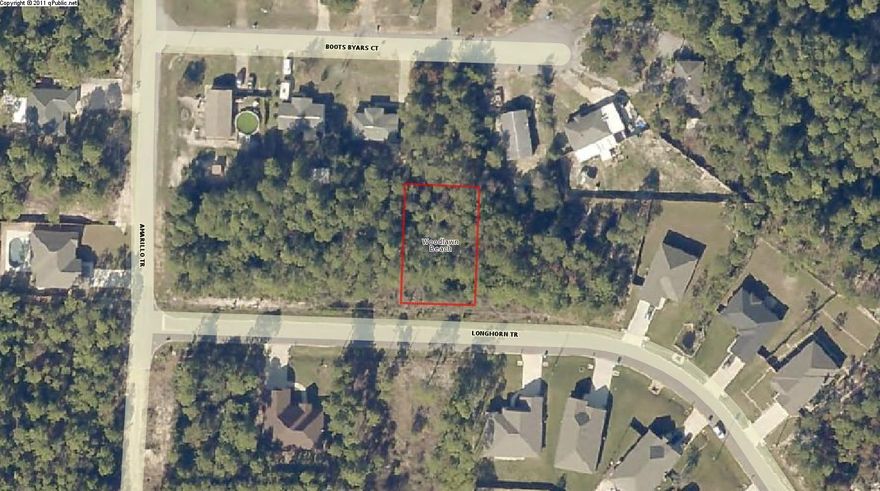 This is a good building lot located on a paved road with utilities available. There is a public boat ramp and access to the Santa Rosa Sound nearby.