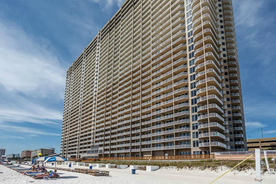 Enjoy one of the resorts with the most amenities in all of Panama City Beach-TIDEWATER! Unit 1201 is one of the nicest furnished 3 bedroom + Bunk Room, 3 bath gulf front condo at this mega-beach resort and priced to sell!! Stunningly excellent 180 degree panoramic views of the sparkling emerald green gulf waters and white sand beaches from sunup to sunrise with wrap-around balcony. Located on the west end of the building, unit 1201 offers 2248 sf of pure comfort. The unit can sleep 10-12 comfortably with a King bed in the Master suite, 4 bunks in the bunk room and a queen size sofa bed in the living area. Completely tiled through-out with carpeting in the bedrooms allow for a clean look and easy care maintenance. Kitchen offers granite counters and a full array of white appliances.