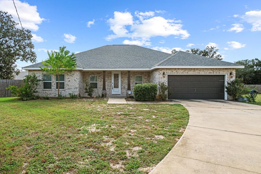 This gorgeous brick home is ready for you to call it home! It features 3 bedrooms and 2 bathrooms with an open concept living room with designated formal dining room space and plenty of room for you and your family to entertain and truly enjoy your home!The kitchen features bar seating, stainless steel appliances, granite countertops and tiled floors throughout. Out back enjoy your LARGE, private yard with a covered porch where you can sit and enjoy your morning coffee or the evening stars.