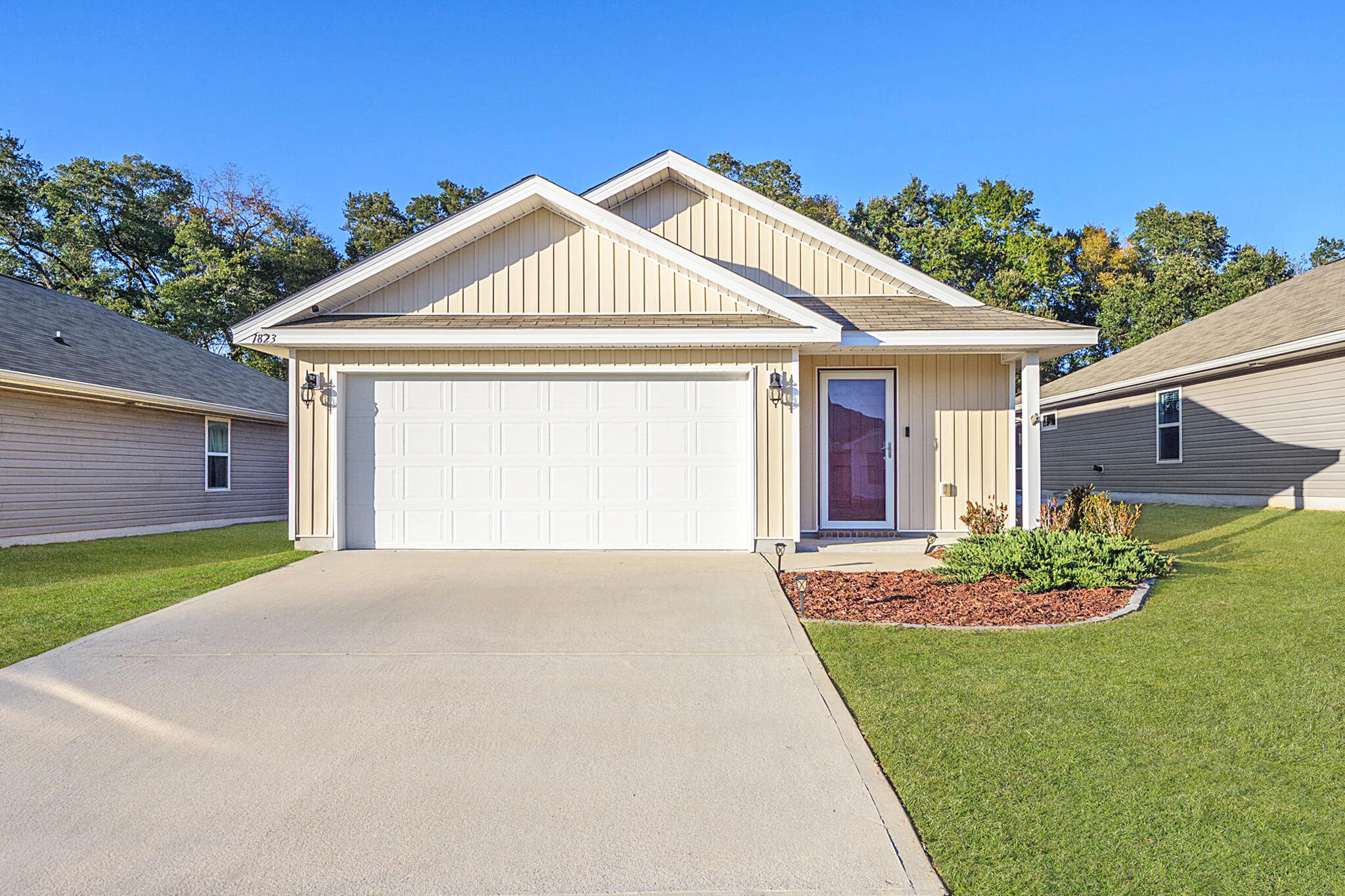 Welcome to this lovely 3-bedroom, 2-bathroom home located in the Ashland Heights neighborhood. Built in 2019, this well-maintained property offers a modern open-concept floor plan that is perfect for both everyday living and entertaining. As you step inside, you'll be greeted by a spacious entryway with a coat closet for added storage that seamlessly flows into the living room, kitchen and dining space. The kitchen is a standout feature, boasting a large island with a breakfast bar, ample counter space, a pantry, and sleek stainless steel appliances. The dining area is adjacent and ideal for family meals or gatherings with friends. The master suite is a tranquil retreat, offering plenty of room for relaxation and a walk-in closet for your wardrobe. The ensuite bathroom is designed for com fort with a new soft close toilet, a double vanity, large tub/shower combo. The two additional bedrooms are located in a separate hallway for added privacy and share a full bathroom that also features a new soft close toilet, making this home perfect for families or guests. Outside, the fully fenced backyard is a true highlight, offering a spacious area for play, gardening, or simply enjoying the outdoors. The property backs up to a tree-lined greenbelt that will never be developed, providing additional privacy and a serene natural view. A two-car garage adds convenience and storage space, completing the package. With its ideal location just 25 minutes from NAS and close to Interstate 10, this home offers both tranquility and easy access to key destinations. Don't miss the opportunity to make this beautiful home yours!