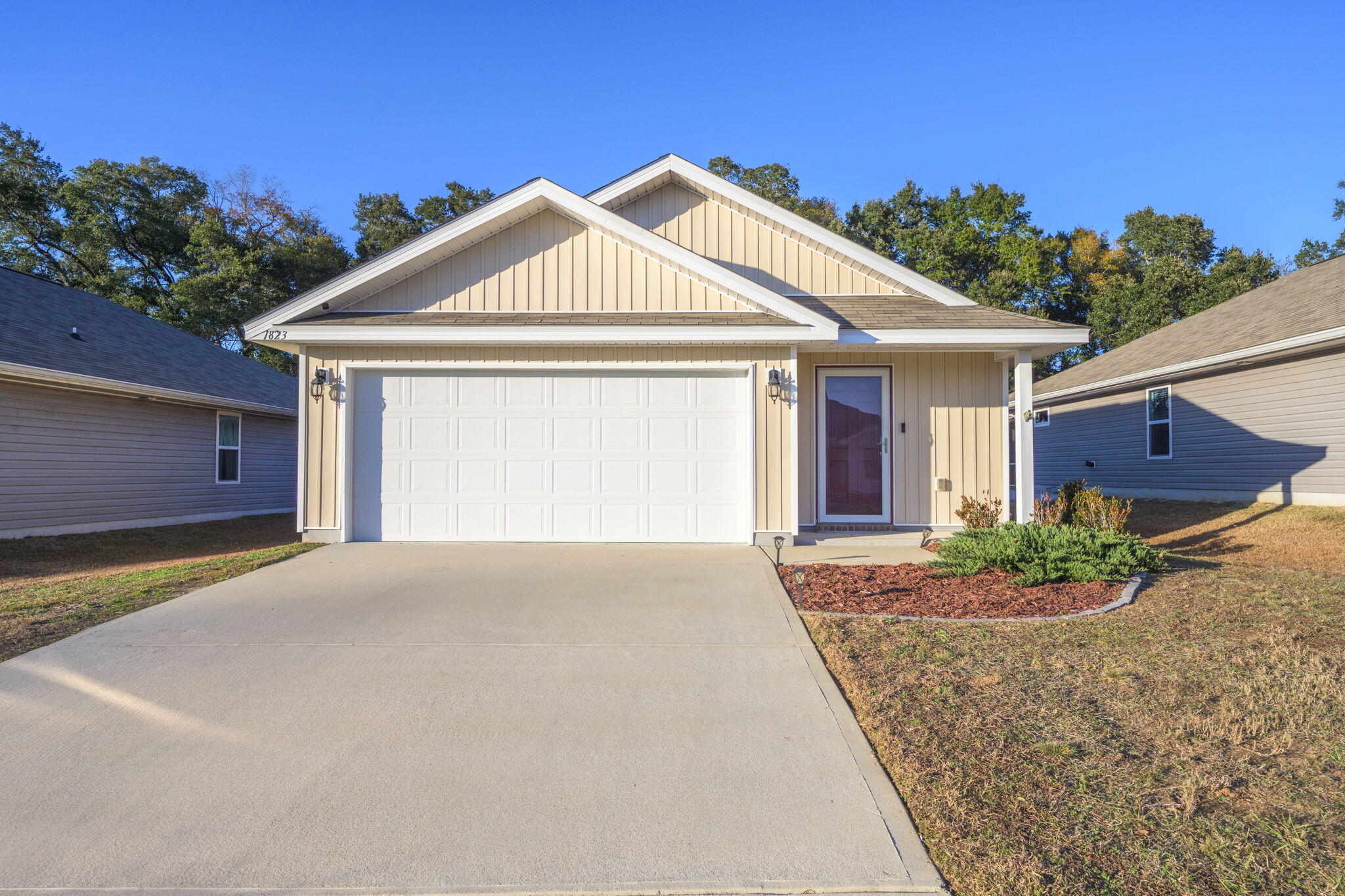 Welcome to this lovely 3-bedroom, 2-bathroom home located in the Ashland Heights neighborhood. Built in 2019, this well-maintained property offers a modern open-concept floor plan that is perfect for both everyday living and entertaining. As you step inside, you'll be greeted by a spacious entryway with a coat closet for added storage that seamlessly flows into the living room, kitchen and dining space. The kitchen is a standout feature, boasting a large island with a breakfast bar, ample counter space, a pantry, and sleek stainless steel appliances. The dining area is adjacent and ideal for family meals or gatherings with friends. The master suite is a tranquil retreat, offering plenty of room for relaxation and a walk-in closet for your wardrobe. The ensuite bathroom is designed for com fort with a new soft close toilet, a double vanity, large tub/shower combo. The two additional bedrooms are located in a separate hallway for added privacy and share a full bathroom that also features a new soft close toilet, making this home perfect for families or guests. Outside, the fully fenced backyard is a true highlight, offering a spacious area for play, gardening, or simply enjoying the outdoors. The property backs up to a tree-lined greenbelt that will never be developed, providing additional privacy and a serene natural view. A two-car garage adds convenience and storage space, completing the package. With its ideal location just 25 minutes from NAS and close to Interstate 10, this home offers both tranquility and easy access to key destinations. Don't miss the opportunity to make this beautiful home yours!
