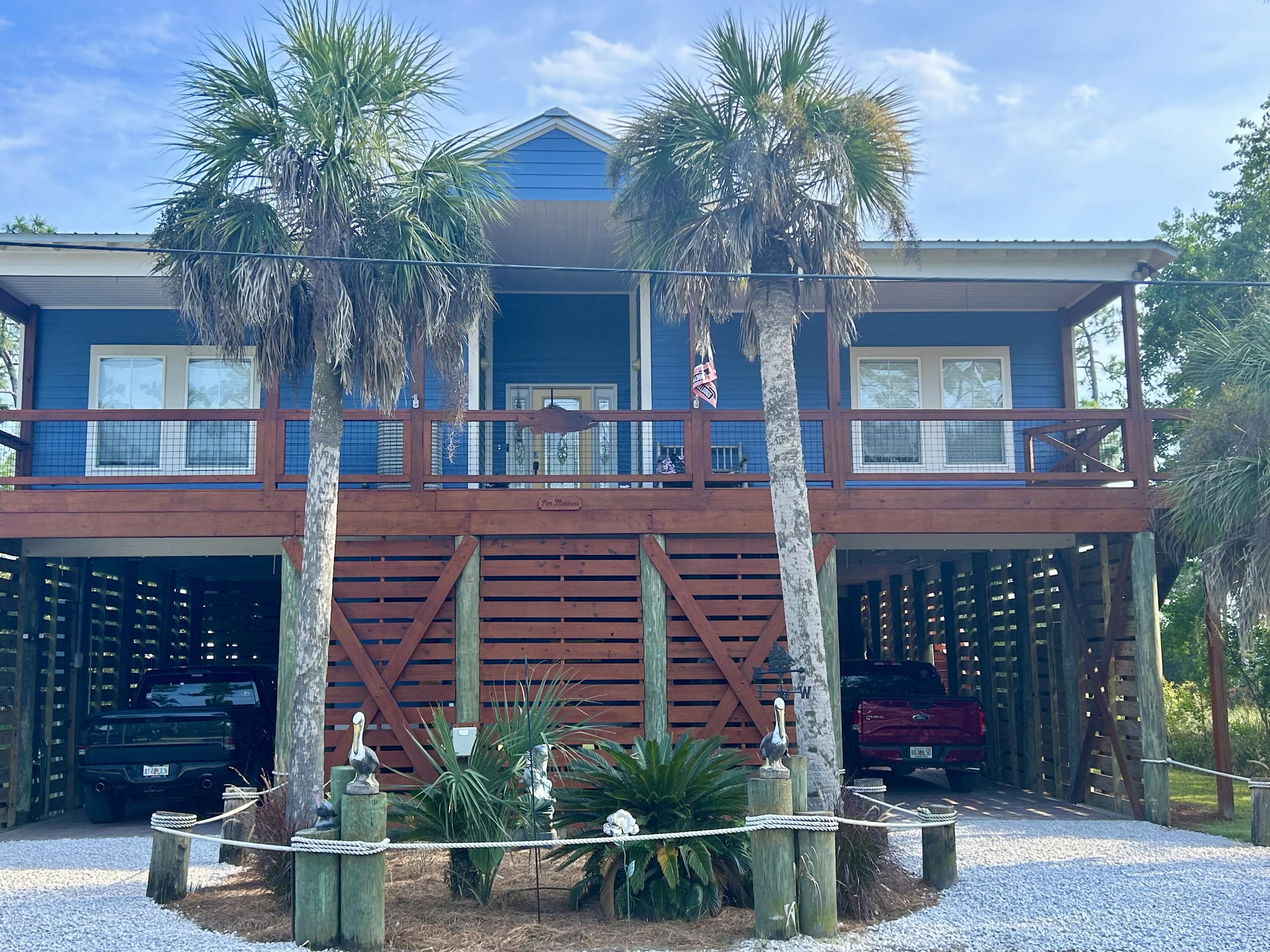 This is a beautiful waterfront 3-bedroom, 2-bath custom-built ranch, 2,200 sq. ft. on a .23-acre lot overlooking the Choctawhatchee Bay, this home combines luxury with tranquility.Walking into the home your focus will go straight to the beautiful stained tongue-n-grove ceilings throughout every room in the home.The home offers an open floor plan with extra large living and sitting rooms offering magnificent bay views from every room. The gourmet kitchen is equipped with granite countertops, brand new stainless steel appliances, a breakfast bar, and a full middle island, perfect for both daily living and entertaining. The party deck under the home has a guest suite for entertaining and a boardwalk to the bay with boat house. Come check it out. Seller licensed realtor