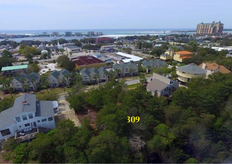Highest elevation in Destin- An opportunity to build your home with great water views -Harbor/Pass/Gulf/Bay. Convenient location just 2 blocks to the Harbor Boardwalk to regular events such as Fireworks, Seafood Festival, Fishing Rodeos, etc.