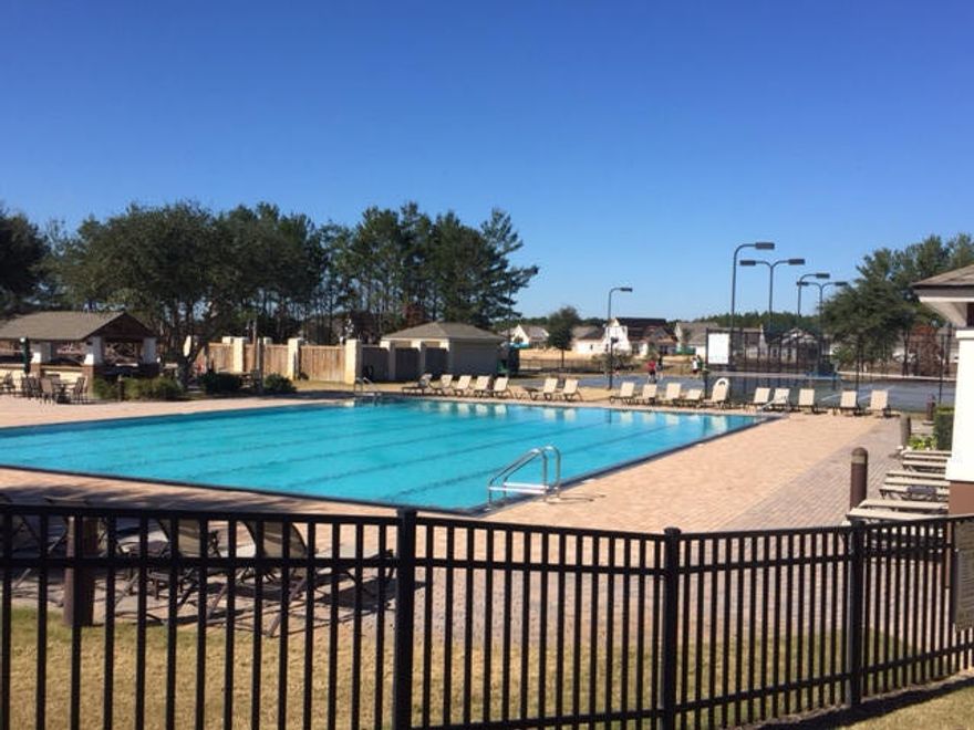 Hammock Bay's Symphony neighborhood. The clubhouse is 6000sq feet including a tier'd movie theatre. You can enjoy a 4000 square ft State of the Art Fitness Center with full Weight & cardio equipment. The Lake Club at Hammock Bay has a 25 meter lap pool, putting green, lighted tennis court, fabulous playground, basketball courts, meeting facility along with a kitchen for events and gatherings.The Waterfront Bay Pavilion offers a pier located on 480 ft. Choctowhatchee bay. Lot is High-N-Dry