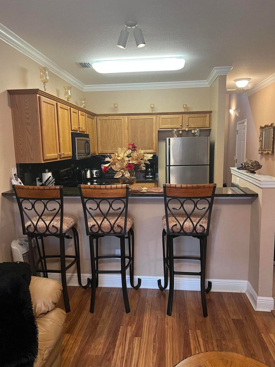 Looking for a your forever home?.Look no further! Hadleigh Hills is located in a quaint community that is off the beaten path yet centrally located. You walk into the first floor to find 9' ceilings, an open floor plan, maple cabinets, and crown molding. This is a 3 bedroom 3 bathroom units with plenty of room. There's a bedroom and one bath located on the
main floor; with a master and another bedroom and bathroom located upstairs.

Fabric hurricane protective shields for that credit on your homeowners insurance. There is a paved walking trail and additional parking for guests. Also an viable option for both Hurlburt Field and  Eglin Air Force Base. Welcome Home....