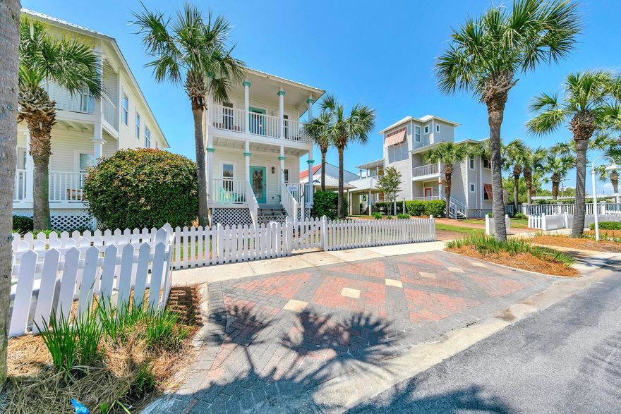 Prime location in the heart of Miramar Beach, just steps to the sand, no roads to cross. Proven Rental Income!  This charming two story cottage offers an inviting front porch leading to an open, spacious 1st floor layout, featuring the kitchen, living area, half-bath and relaxing back porch. The 2nd floor features a large primary bedroom with an en-suite bath and private porch overlooking the quiet cul-de-sac street. The guest bedroom features an en-suite bathroom and relaxing private porch. Gulfside Cottages has 2 Beach Accesses, white picket fences throughout, lush landscaping, and heated community pool. Each home has a detached carport w/ storage. Conveniently located to shopping, grocery stores, fast food & fine dining. Sold Fully Furnished