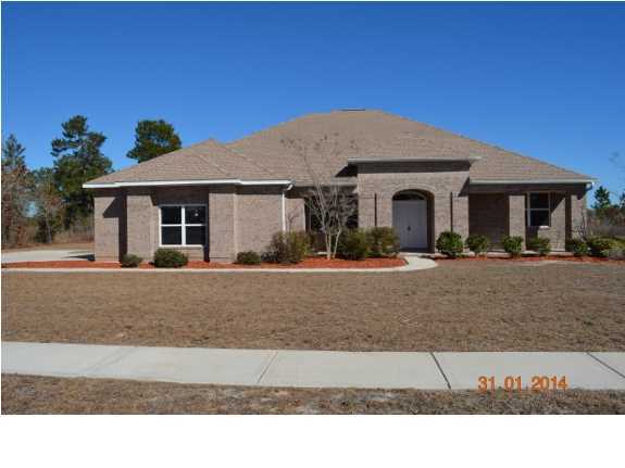 Nice brick home located in the gated community Windswept Dunes. Situated on the 17th fairway. Home features 4 bedrooms and 3 baths. Large open floor plan with granite countertops and new appliances in kitchen. Home is eligible for Freddie Mac financing. during the first 20 days a home is listed for sale in the MLS. Only offers from owner-occupants (primary residence), second home buyers and public entities or their designated partners will be considered. Offers from investor purchasers will not be considered until after the initial 20 days of the listing being in the MLS 02/20/2014. *** Seller is offering a home warranty credit up to $500 for owner occupant offers (primary or secondary home) . The buyer must identify and select the home warranty company and plan of their choice.**