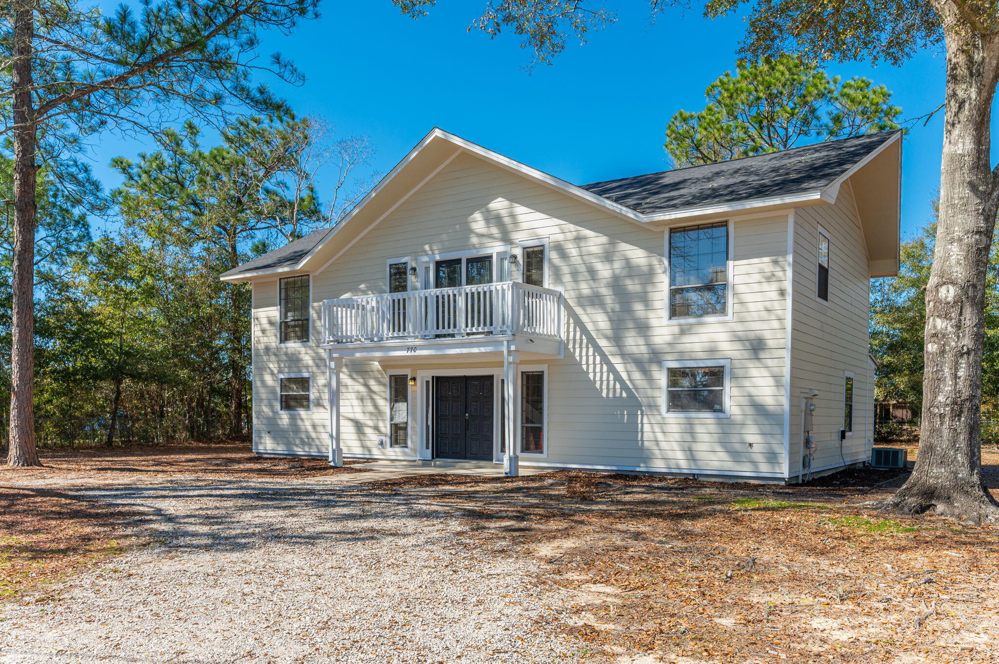 Discover the charm of this three-bedroom, three-bathroom, two-story home with an open floor plan, offering enchanting Lake Stanley views from every bedroom. The spacious living area, well-lit kitchen, and a small wet bar add to the allure. The Master Bedroom features a walk-in closet, and the Master Bath provides a sunken tub and dual vanities. Outside, the covered patio enhances the appeal of this haven. Don't miss the opportunity to make this two-story retreat your home! Requirements include a minimum of 600 credit score for all adults, household monthly income of $4935 per month and one year of on your job. Dogs are allowed on a case-by-case basis with a non-refundable $300 pet fee.