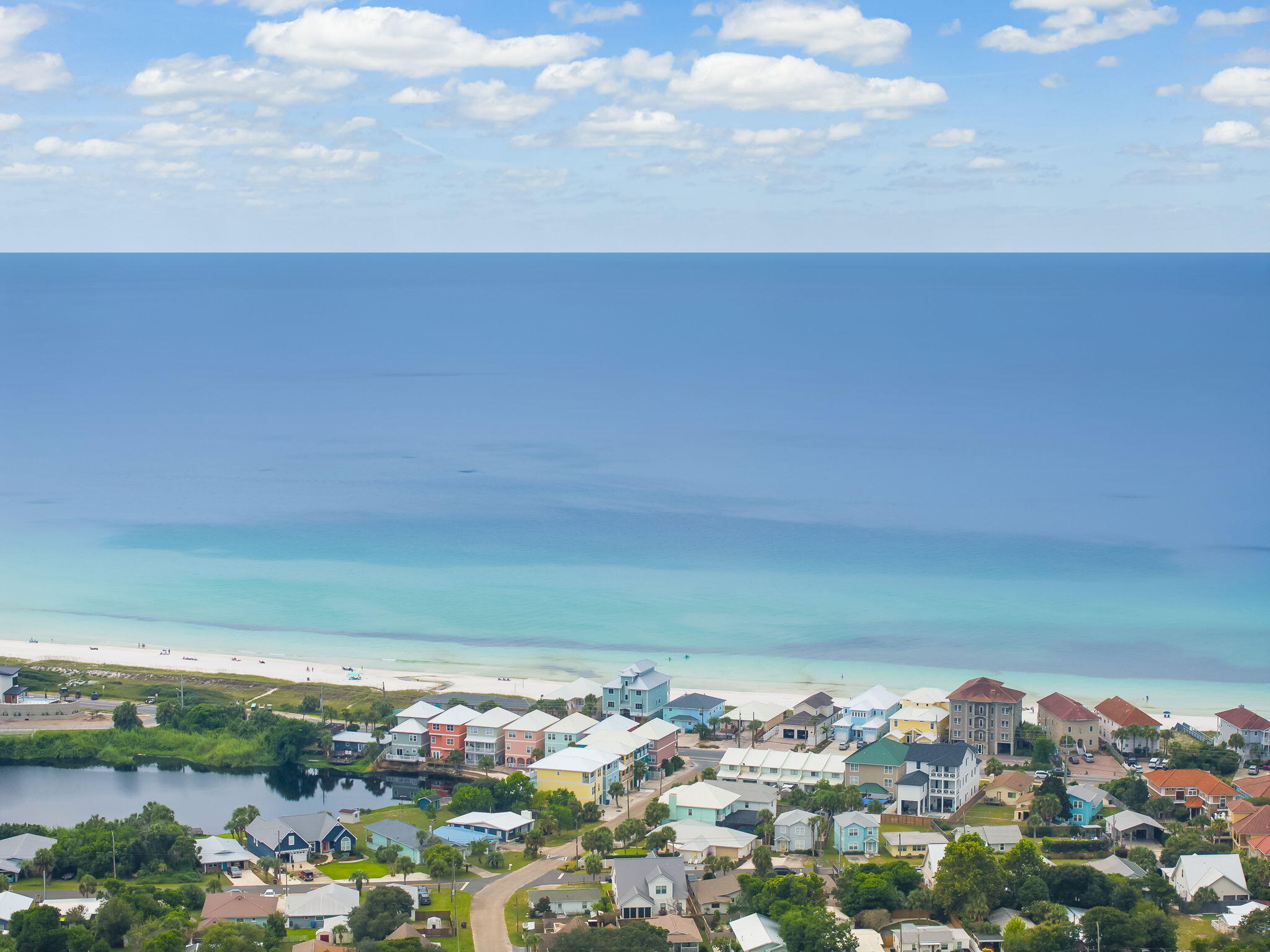 Coastal Living Starts Here! Build your dream just minutes from the beach. Located in a sought-after beachside community, this pristine vacant lot offers the ideal setting for your future home, vacation retreat, or investment property. With no HOA and a peaceful, well-established atmosphere, it's the kind of opportunity that rarely comes along - and never lasts long. The beach is just minutes away, easily accessible by golf cart, bike, or car. Whether you're heading out for a morning walk along the shoreline or catching a sunset over the Gulf, the coastal lifestyle is always within reach. Beyond the beach, you'll enjoy convenient access to local parks, boat launches, shopping, dining, and educational resources. From charming cafes to vibrant community events, everything that makes Panama City Beach special is right around the corner. Utilities are nearby, the street is paved, and the area is experiencing steady growth - making this a smart move for buyers with vision. Whether you're ready to build now or planning for the future, this lot delivers on location, lifestyle, and long-term potential. Opportunities like this don't wait. Secure your place in one of Florida's most iconic coastal communities and start building the life you've imagined.