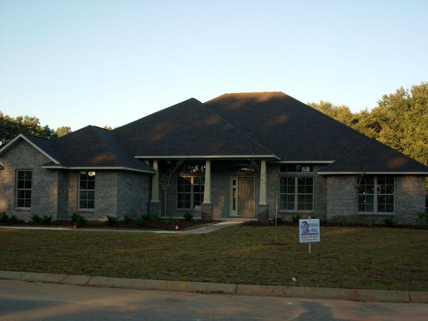 Photo is a sample. Pre-sale, beautiful home with four bedrooms, three bathrooms, granite countertops in kitchen and all bathrooms, full tiled shower with frameless glass door in master bath, spacious florida room, formal dining room, living room and large great room, sprinkler system, energy efficient