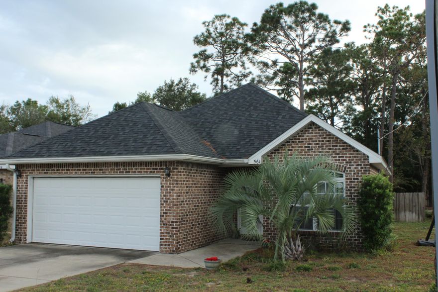 Gorgeous 3 bedroom and 2 bath home with 1564 Sq Ft located in Valpariaso, FL, convenient to the military bases, shopping, and BEACHES! This home is just minutes to the Eglin AFB! This home features a split and open floor plan! The kitchen opens to the living room and dining room and features granite countertops, stainless under mount sink, breakfast bar that seats 2-3 and stainless steel appliances. The appliances included are a French Door Refrigerator, Slide in Stove/Oven, Built in Microwave and Dishwasher. There are custom cabinetry in the kitchen with crown and brushed nickel hardware.