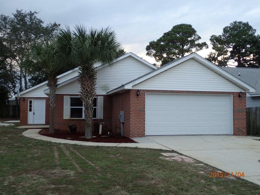 This REO is move in ready! Recently refurbished, this conveniently located home in the heart of Gulf Breeze and Tiger Point areas is only mins from shopping, churches, and Garcon Point bridge. This 3 bedroom home has 2 baths and new garage door and opener, new flooring in most of the home, titled baths, updated fixtures, new appliances and updated vanity and kitchen tops. Home will qualify for all financing and is most definitely a must see before it's gone property. Call today to set up your showing!