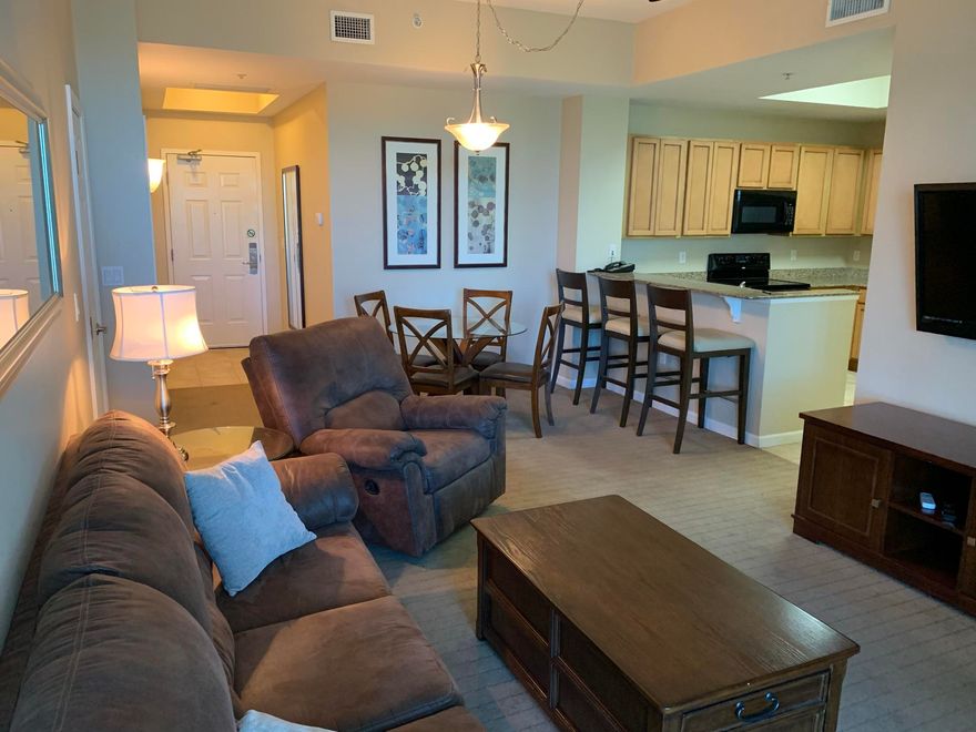 Motivated Seller is willing to pay new buyer fee of 3786.16. Bring best OFFER!!! Ground floor, furnished full 2 bedroom unit at The Palms of Destin. Kitchen features granite countertops and maple cabinetry. Newer furniture, 55' TV in LR and sleeper sofa. TV's are newer 50'in the MBR. 2nd BR has 46'.  Amenities at The Palms are first class. They include an expansive 11,000 SF lagoon pool with waterfall and spa, children's pool, playground and splash pool, lighted tennis and basketball courts, first class fitness center, and covered protected parking. Also on site is the conference center,and office center. THE HOA FEES INCLUDE ALL UTILITIES, INCLUDING ELECTRICITY, WATER, CABLE, AND INTERNET, HOA fees are $2,839.62/quarterly. Newer Kaba E-Plex lock. Buyer to verify all information
