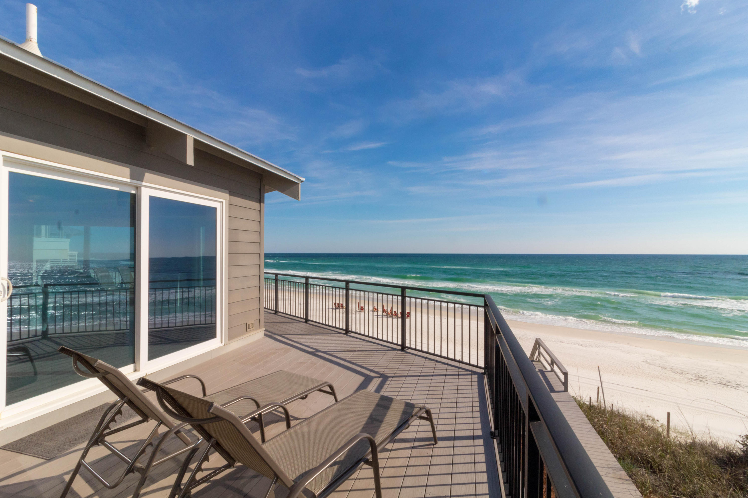 This is it! Beach front living the way it was meant to be, with 180 degree views to be able to take both the sunrise and sunset from your indoor or outdoor living spaces! Located in Inlet Beach, a short stroll to Rosemary shops and restaurants, Nifty Shades of Gray has been fully remodeled in 2013 with all new systems in place and a new roof in 2017. Rest assured, there is even a seawall in place! Nifty Shades of Gray's perfect position offers one of the most private beach front settings on all of 30A! From the open concept kitchen, living, dining space and its clean designs, blend the past with the present and allow rest and relaxation along the emerald coast.