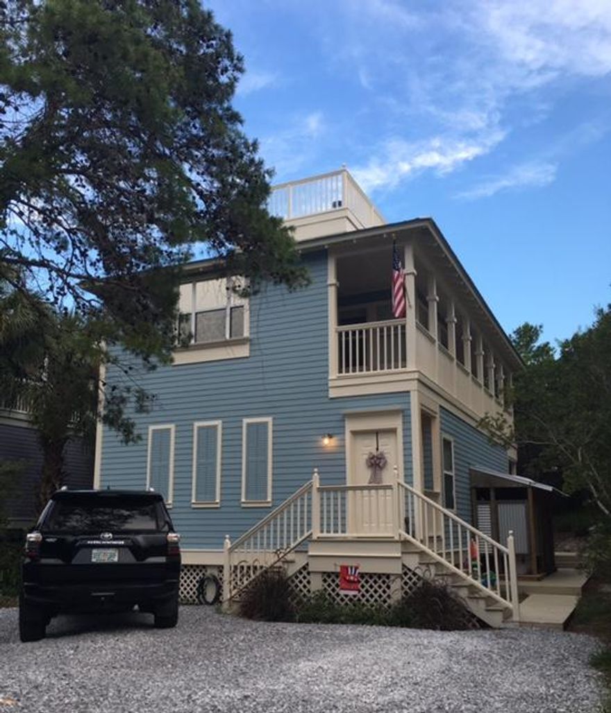 Charming beach cottage in lovely, gated neighborhood just off of 30A with views of the gulf! All bedrooms and 2 baths are on the first floor with the open living area, kitchen and half bath on the second floor. Double French doors in the living room open up to a large wrap around porch. Perfect for entertaining! You will spend lots of time on the rooftop deck where you can watch the waves in the gulf or have a birds eye view of the neighborhood. It is just a short walk to the beach, shops and restaurants along 30A.More pics coming soon!