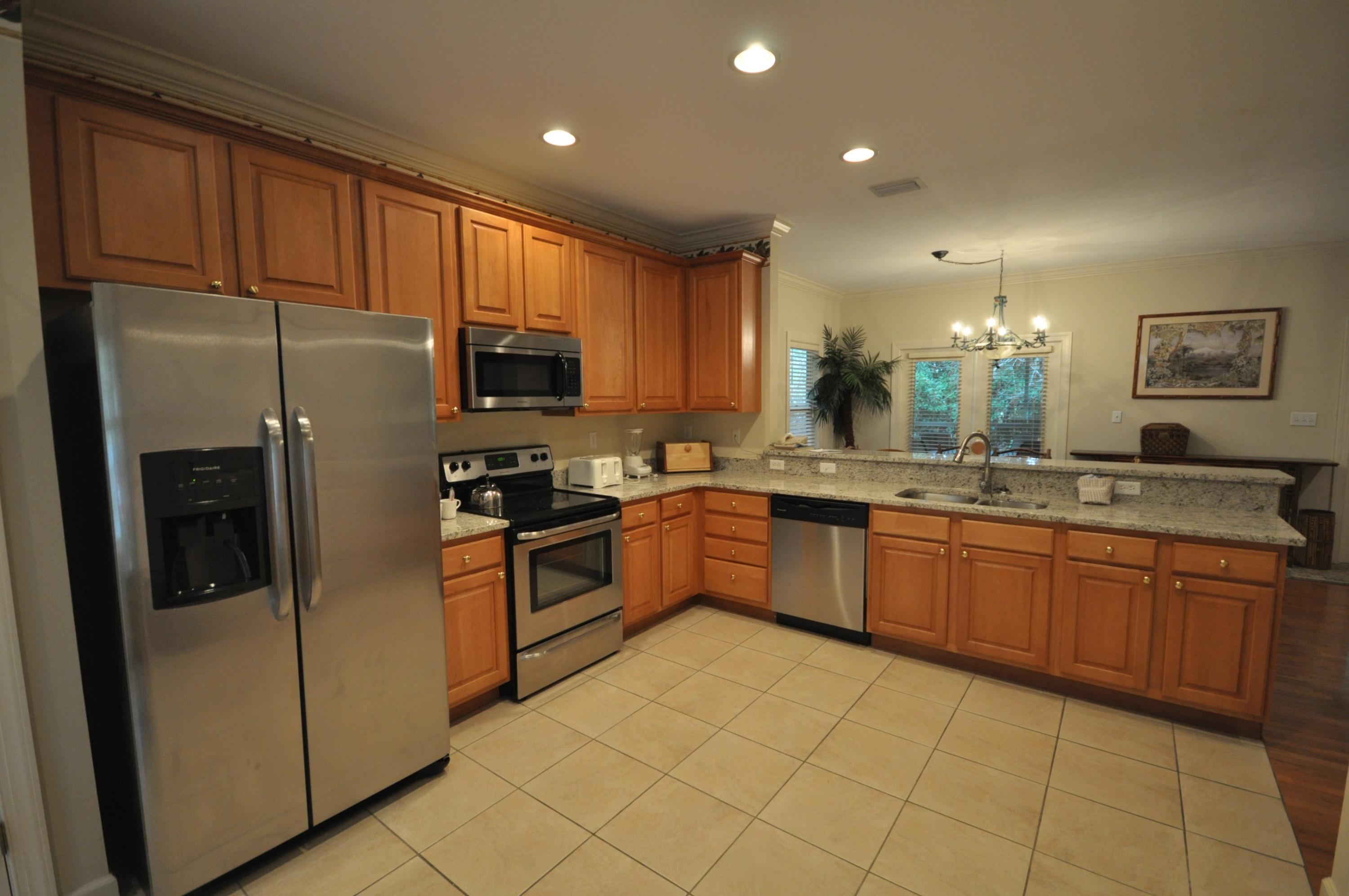 Located in Prestwick, a quiet rental capable neighborhood of cute Florida Cottages located with the gates of Sandestin Golf and Beach Resort. The large open floor plan and ample parking is popular with renters and owners alike. The first floor features brand new living room furniture, warm wood flooring throughout, gas log fireplace, dining area, large updated kitchen with brand new stainless steel appliances & granite counters, breakfast nook and breakfast bar, and two bedrooms each with their own private bath. Upstairs is the private master retreat with large bedroom, walk-in closet and master bath. Enjoy an oversized balcony off the master and a screened in porch