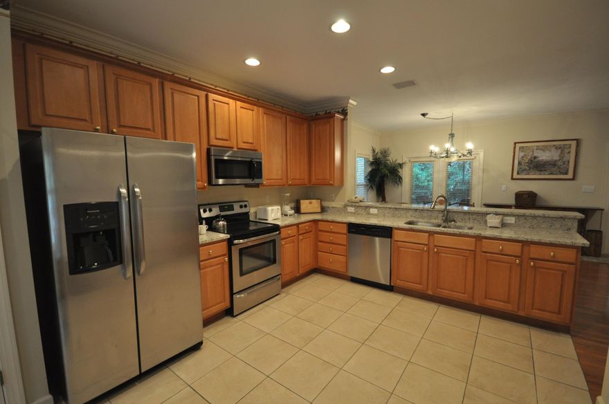 Located in Prestwick, a quiet rental capable neighborhood of cute Florida Cottages located with the gates of Sandestin Golf and Beach Resort. The large open floor plan and ample parking is popular with renters and owners alike. The first floor features brand new living room furniture, warm wood flooring throughout, gas log fireplace, dining area, large updated kitchen with brand new stainless steel appliances & granite counters, breakfast nook and breakfast bar, and two bedrooms each with their own private bath. Upstairs is the private master retreat with large bedroom, walk-in closet and master bath. Enjoy an oversized balcony off the master and a screened in porch