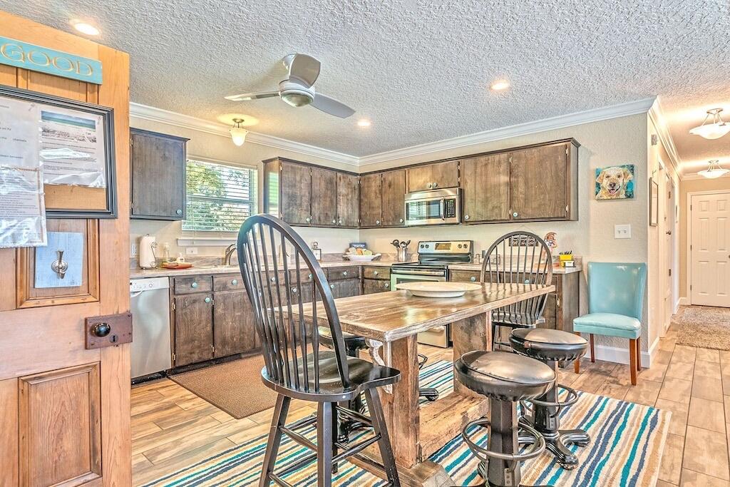 Stunning Fully Remodeled 4-Bedroom, 2-Bath Home on 1 Acre - Move-In Ready!Welcome to this beautifully renovated 4-bedroom, 2-bathroom home, nestled on a generous 1-acre lot. Boasting modern finishes and an open, airy layout, this property is perfect for those seeking both comfort and style. Featuring tile flooring throughout, this home is both durable and easy to maintain, offering a sleek and polished aesthetic.Key Features:Fully Furnished: The home is being sold completely furnished, making it a turnkey option for those ready to move in.Spacious Living Areas: Enjoy the open-concept living, dining, and kitchen spaces.Split Floor Plan: Enjoy the privacy of the master bedroom situated on the opposite end of the home from the other 3 bedrooms.