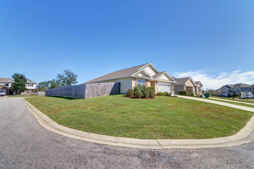 Welcome to this better than new 4 bedroom/2 bath home located in the popular south Crestview neighborhood of Partridge Hills! Positioned on a spacious corner lot with a huge FLAT fully fenced in backyard, this is the perfectly fully upgraded home you've been waiting for! Other than carpet in the bedrooms you'll find luxury vinyl plank flooring throughout and upgrades like granite countertops in the kitchen and both bathrooms, stainless appliances, and even additional recessed lighting in the kitchen. Enjoy 3 two great sized bedrooms at the front of the house, and walk down the fantastic entry hallway to discover the interior laundry room (washer and dryer convey!) and an additional third bedroom.  Walk through the open concept kitchen and living room to discover the owner's suite at the