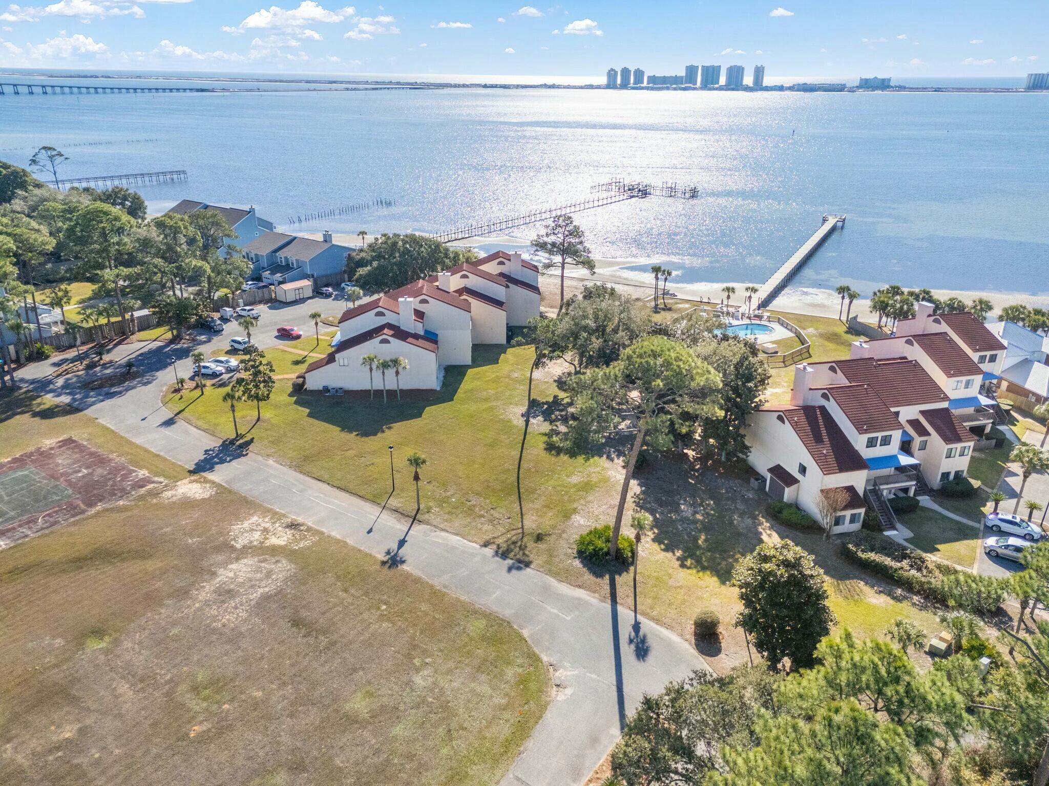 Attention Developers & Investors:Take advantage of the R2 zoning! This property can be subdivided into three waterview parcels, good potential for development.Utilities Ready: Water and sewer available.Prime Location: Minutes from Navarre Beach, dining, and shopping, with easy access to the beauty of the Emerald Coast.Don't miss this unique opportunity--your new build or next big project awaits!