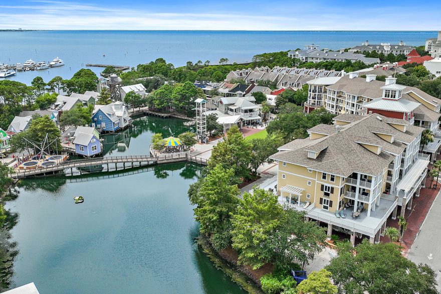 Lifestyle and amenities to fit the whole family!  Recently updated and fully furnished, this 2 bedroom, 2 bathroom corner unit in the heart of Baytown Wharf is the perfect getaway! Located in Observation Point South, this spacious condo features updated flooring throughout and a wraparound balcony - ideal for taking in the weekly fireworks, lounging or entertaining. Enjoy a lagoon style pool, grilling area, fitness room,  walking paths and Sandestin's world renown golf courses. The Founders Club has a large screen TV, seating area, kitchen, pool table, and roomy balcony overlooking the Events Plaza.  Bring your beach gear, this unit also comes with a storage cage in the garage! Personal items in storage cage and owner's closet do not convey.