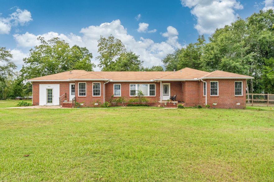 Spacious well maintained 4 bedroom, 2 bath brick in Florala, Al. Currently zoned mixed use. Seller has continued to update home with double pane windows, updated kitchen appliances, and more. New HVAC in 2016 and water heater in 2017. Original oak floors. Fireplace in Living Rm. Will need inspection(Seller doesn't use). Master bedroom has separate entrance allowing many uses other than bedroom (perfect office). Rooms are spacious especially. Living Rm. Ceramic tile in kitchen, breakfast nook and hall bath. Carpet in master suite. 9x12 indoor laundry rm. Pull down stairs to  attic. Carport is off laundry rm. Wonderful yard with pecan trees. Fenced in area in back yard plus newer storage building. If you are looking for space  or a place for an at home business, this is it!! Sold as-is.