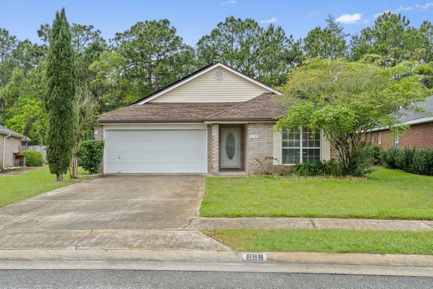 Awaken to the serene charm of 698 Randall Roberts Road, a delightful haven nestled in the heart of Fort Walton Beach, FL. This spacious 2,152 sq ft home offers a harmonious blend of comfort and style, perfect for those seeking a tranquil retreat with all the conveniences of modern living. With four generously sized bedrooms, this home provides ample space for relaxation, creativity, and rejuvenation. Immerse yourself in the soothing ambiance of two full bathrooms, where elegant fixtures and thoughtful design promise a spa-like experience every day. The open floor plan invites gatherings and memorable moments, seamlessly connecting the living, dining, and kitchen areas.