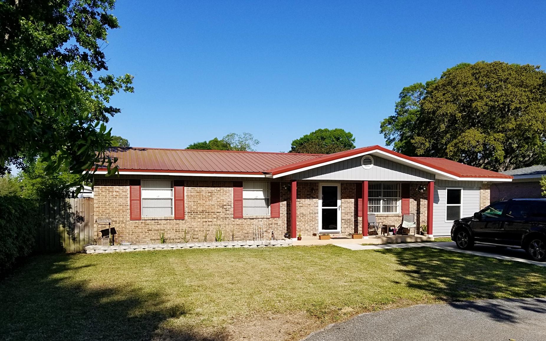 A must see house in Shalimar located minutes from Eglin AFB and the Shalimar Little League Baseball Fields. Recently installed metal roof will give decades of secure protection. New siding, and driveway paving takes this charmer to a fresh renovated level. This well maintained home at the end of cul-de-sac has many upgrades such as Dishwasher, Kitchen Cabinets & Counter tops, Tile flooring in all rooms, 8 Ceiling fans, Vertical blinds, heated Laundry room, new Roof, new Storm Windows, attic 134 insulation, freshly painted. This 4 bedroom home with a bonus room and large lot at end of cul-de-sac is perfect for the military family.