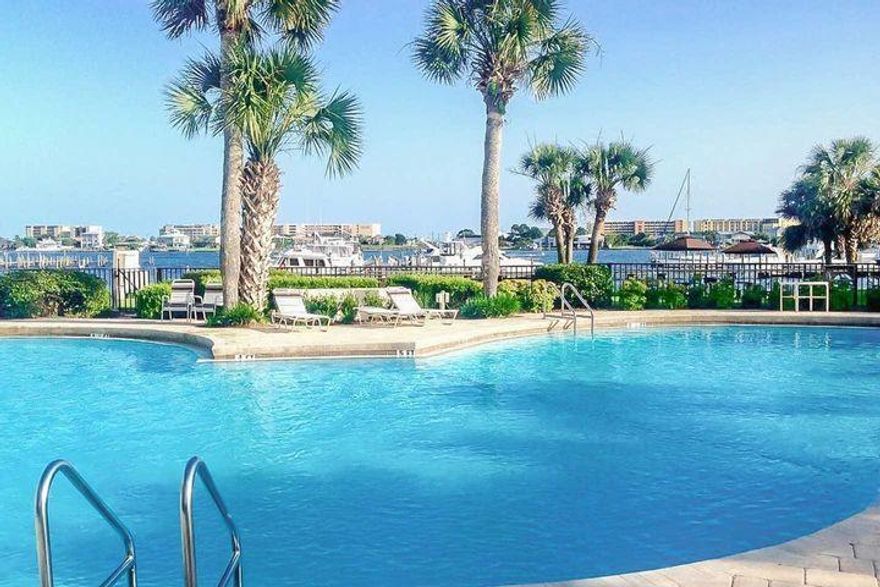 WATERFRONT CONDO WITH BOATSLIP!  Rare & unique opportunity to own a Santa Rosa Sound front studio with a 35-foot boat slip in your backyard! Ideally situated unit with crown molding and a full size refrigerator. Its located right off the main pool! Excellent rental income producing investment or a perfect 2nd home getaway!   Pirates Bay offers 2 huge pools with plenty of lounging chaises, a BBQ Grill, & picnic tables.  Located near Okaloosa Island ... with  phenomenal shopping, restaurants, entertainment & a world class fishing pier.