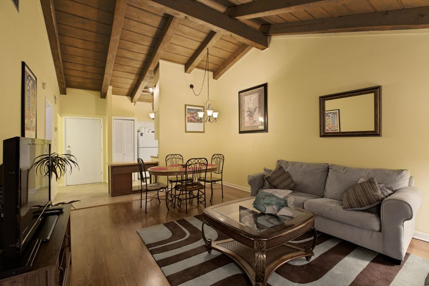 Spacious 1 bedroom unit with proven rental history! This property features a vaulted ceiling in the living/dining room making it feel much larger than your typical one bedroom unit. If you are looking for a quaint beach getaway this is your property. In 2015 the property grossed over $20,000. It has consistently gotten better each year with rentals. It grossed $18,000 in 2013 and $19,000 in 2014. The seller has put in a more durable floor tile in the kitchen and bathroom area. Buyers and/or their agents should verify all dimensions and information to their satisfaction.