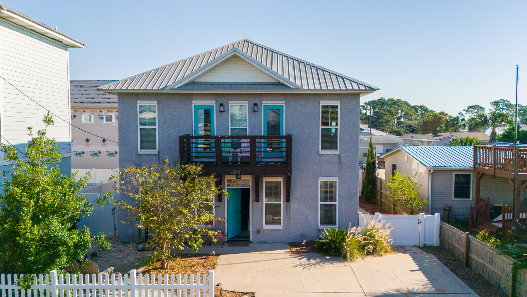 Welcome to your dream beach house! This gorgeous 4-bedroom, 2.5-bath home is located on the east end of PCB and just a short walk from the beach, making it a prime spot for vacationers or investors. Fully furnished and turn key, boasting an impressive rental history of $76K in both 2023 and 2024, this property promises great returns and endless coastal charm.Inside, you'll find custom cabinets, granite countertops in the kitchen, and a luxurious master bathroom with a separate shower. The spacious, open floor plan includes a second-floor laundry room for added convenience. Step out onto the balcony for stunning beach views and enjoy the coastal breeze.Don't miss out on this incredible opportunity to own a beachside retreat! Schedule a tour today and make it yours!