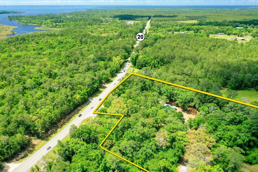 JUST LISTED! Approximately 5 1/2 acres in a picturesque Old Florida setting that includes (4) parcels of Walton County, Florida record. Zoned Rural Residential, this assemblage of parcels would offer a perfect setting to accommodate a private family compound.  The existing home was constructed in 1971 and contains 3 bedrooms and 2 baths and is being sold, ''as is.'' Please inquire for further details.
