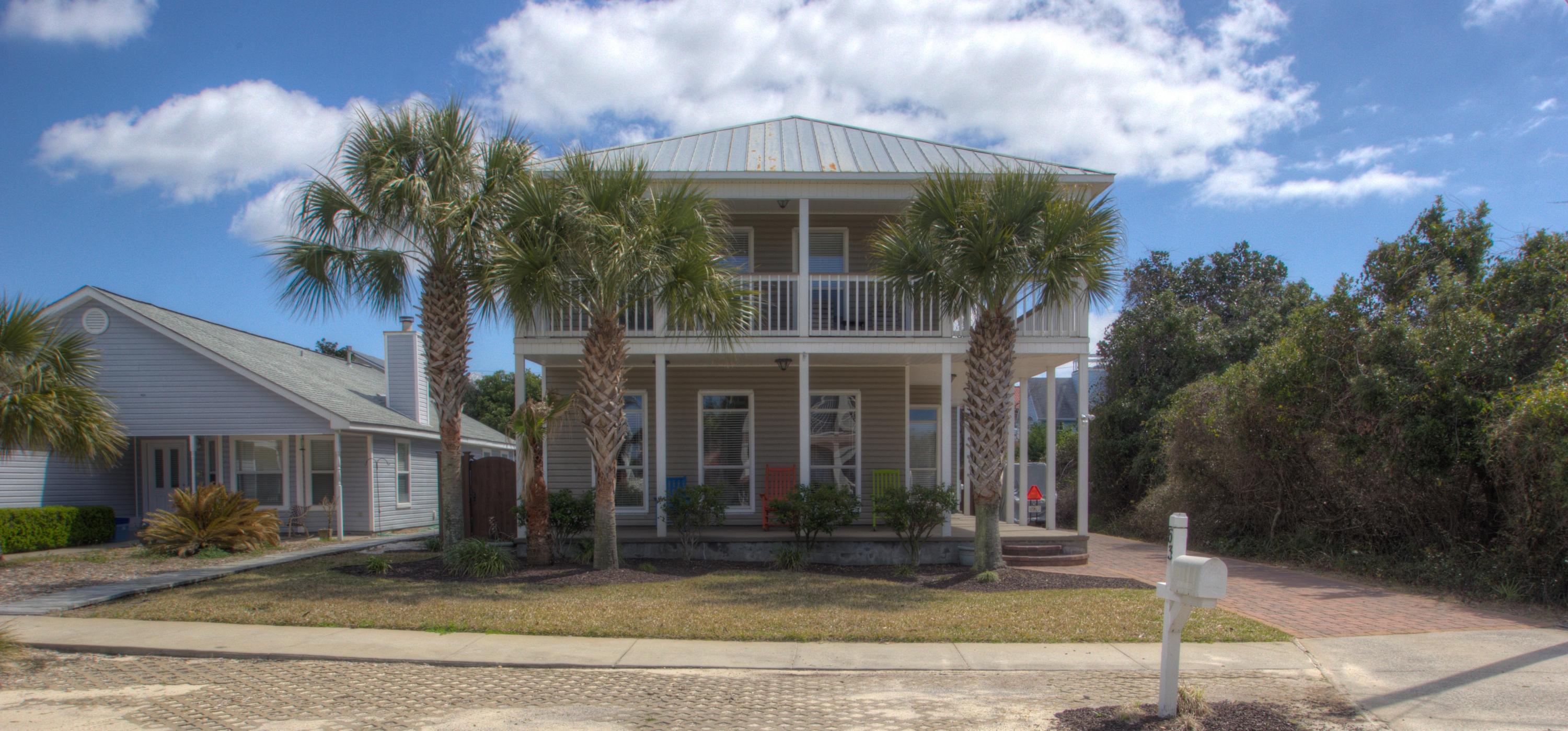 Great home in Crystal beach! So close to the beach with gulf views from the upstairs porch. This beautiful home has 4 bedrooms- 3 up and 1 down as well as 3 and 1/2 baths. From the large master bedroom, you can step on the balcony and enjoy the serenity of living so close to the beach. Features include stainless appliances, granite countertops in kitchen, pool with heater, privacy fence, a security system, 9' ceilings, hurricane shutters, separate shower and jetted tub in master and new carpet in bedrooms. Great home or rental property!
