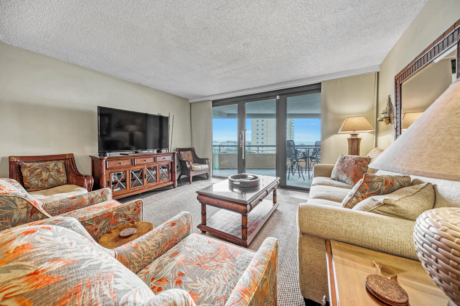 360 VIRTUAL TOUR* Fabulous 6th-floor condo offers breathtaking views of lushly landscaped grounds, pools and the Gulf from the ENOURMOUS covered balcony. Beautifully updated throughout with gorgeous custom kitchen cabinets, impressive granite, stainless appliances, trey ceiling with accent lighting and crown molding. Wood-look tile flooring in the living areas, bathrooms updated with granite counters, tiled shower in the master and tub/shower combo in the guest. Conveys fully furnished with room to sleep 7! Edgewater Beach is centrally located in Miramar Beach...gated with 2 levels of covered parking, multi level pools (one seasonally heated), tiki hut, hot tub, playground, basket ball & shuffleboard, fitness room, lawn space to play and 420' of white beach and owners storage closet!