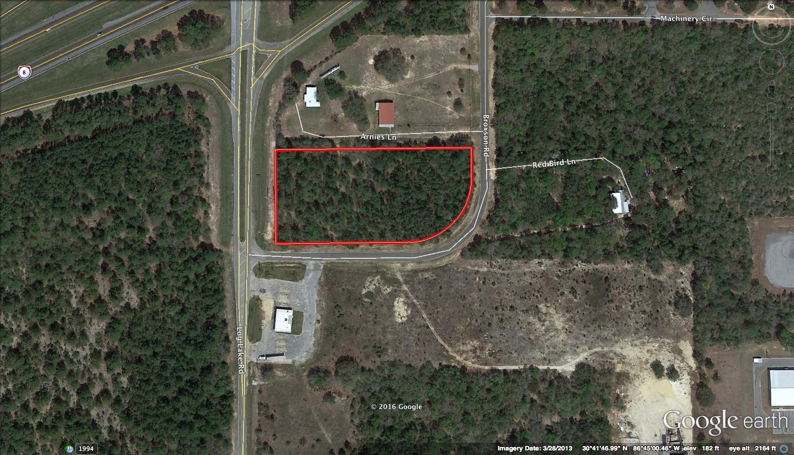 Corner lot at the I-10 Exit in Holt! New development area just West of Crestview and East of Pensacola. This level corner lot has lots of frontage on paved roads. Being visible from I-10, this would be a great place for a gas station, restaurant or both.