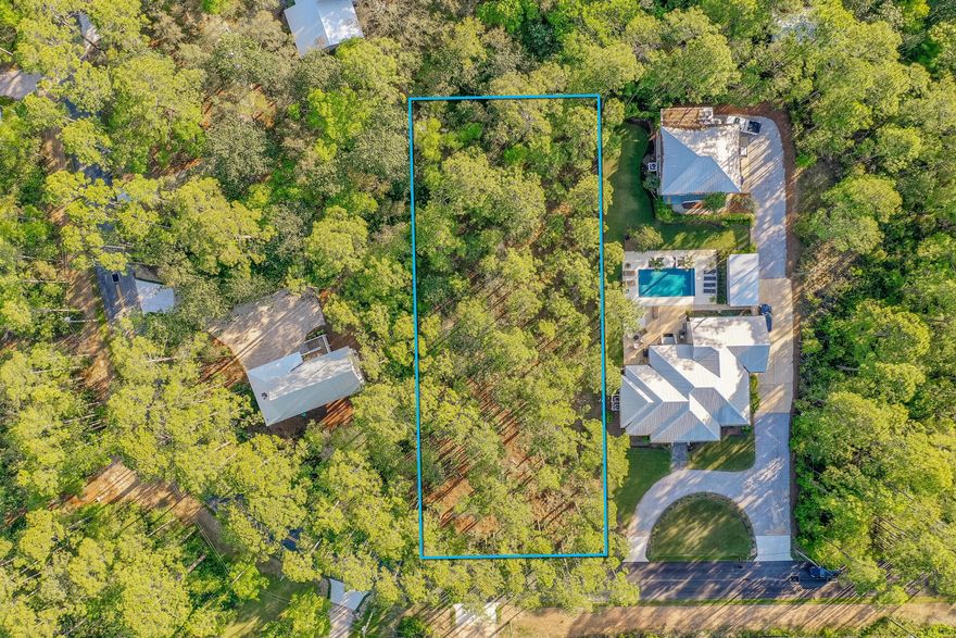 Large Lot in the highly desirable area of Historic Point Washington.  Only a few minutes to the boat ramp! This lot is large enough to build your dream home plus a carriage house or a pole barn for your boat!  There is no HOA fees and no build out time!  Great opportunity in a beautiful area near the bay!