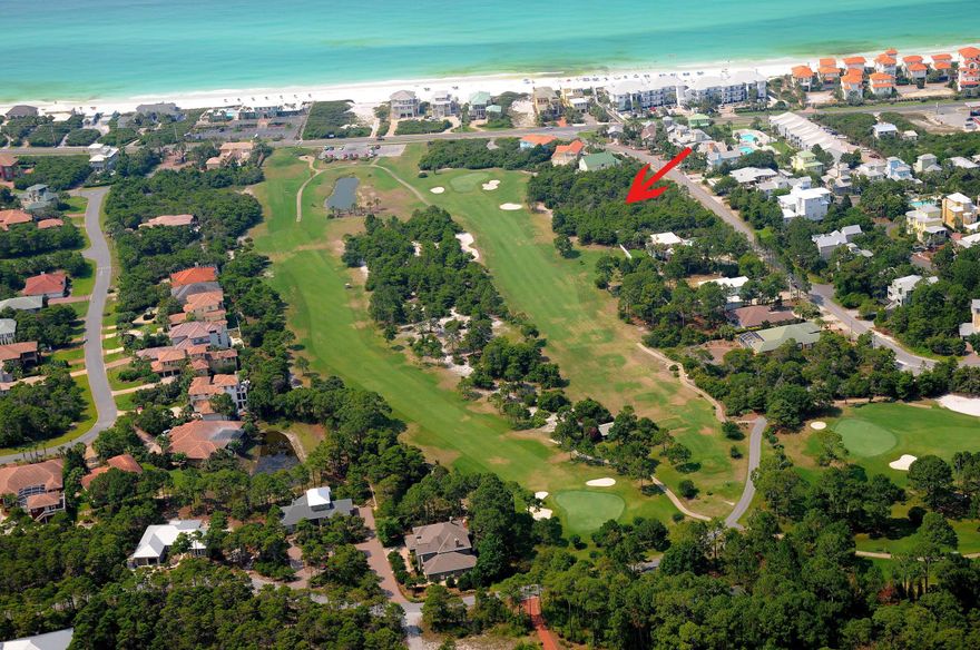 Beautiful large lot just across from Allen Loop beach access. On fourth hole of Santa Rosa Golf Club. No HOA and no build out time.