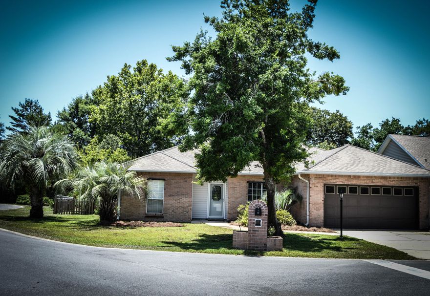 This beautiful all-brick Bluewater Bay home is located on a large cul-de-sac lot walking distance to Bluewater Elementary School. The home has been completely repainted with all new lighting fixtures and fans. Cathedral ceilings and an open floor plan make this home feel spacious and welcoming. Home features a large great room upon entering with a gas fireplace and built-in bookshelves. Split bedroom floor plan with Master on one side and two additional bedrooms on the other offer privacy. Home has an additional Florida room where you can sit and relax while taking in all of the beauty of the lush landscaped backyard. There is a large open patio with natural gas hook-up for grill. This home features 9 ft. smooth ceilings, beveled glass front door, built-in bookcases,