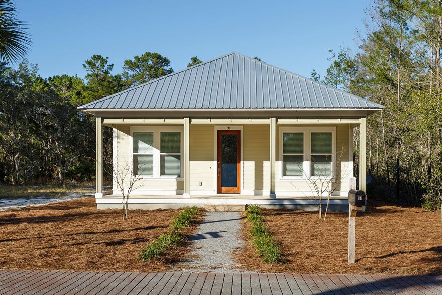 This brand new, masterfully constructed Florida Cottage offers an open concept with expansive front and back porches. Notable features include 10 foot ceilings, walk-in closets, quartz countertops, shaker style cabinets and wood-look floors throughout. Additionally, there is a detached garage and a security system. Located in the heart of Pt Washington, steps from the bay and a short drive to the beach. Grayton Bayou Community amenities include pool, neighborhood boat launch, and a county dock is just steps away.**Buyer is responsible for personally verifying details about this property. All information contained on the listing is believed to be accurate but not guaranteed. **