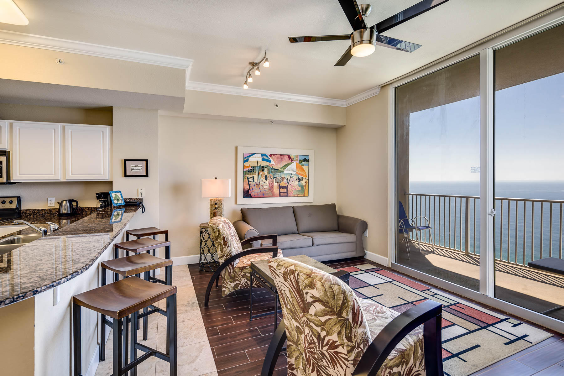 If you are looking for a vacation rental unit that customers review as kids loved the bunks, husband loved the balcony views, and I loved the kitchen space then Tidewater Unit 2806 is the one for you! This spacious 1 bedroom/2 bath with hallway bunk unit boasts new wood-look ceramic tile in the living and bedroom areas, as well as tile throughout the entire unit! The modern dcor and warm neutral tones, along with updated lighting fixtures make this unit a must see! The spacious kitchen features extra cabinet storage space and granite countertops, along with stainless appliances! With a unit that is rental ready, exhibits excellent guest reviews, has the best amenities along the beach and its close proximity to Pier Park, you can't go wrong with Tidewater Beach Unit 2806!