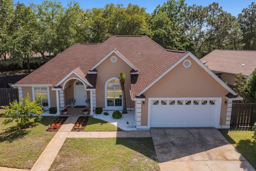 Located on one of the largest fenced in lots in Bayside HOA, this customhome with a 2 car garage is just shy of 2000 sq feet. 10 ft ceilings inthe living area with crown molding, double tray ceilings in somebedrooms, hardwood floors throughout is just some of the amenities. Only15 minute WALK to the Public Beach and a 5 minute walk to over a dozenrestaurants and Silver Sand Outlets this home makes an excellent choiceif you want a house to raise a family by the beach or find a retirementretreat. Maintained with love and care this house has many currentnotable upgrades: New Roof and Gutters in 2019; New A/C unit in 2021;Completely New Kitchen (Shaker White soft closing ceiling heightcabinets),