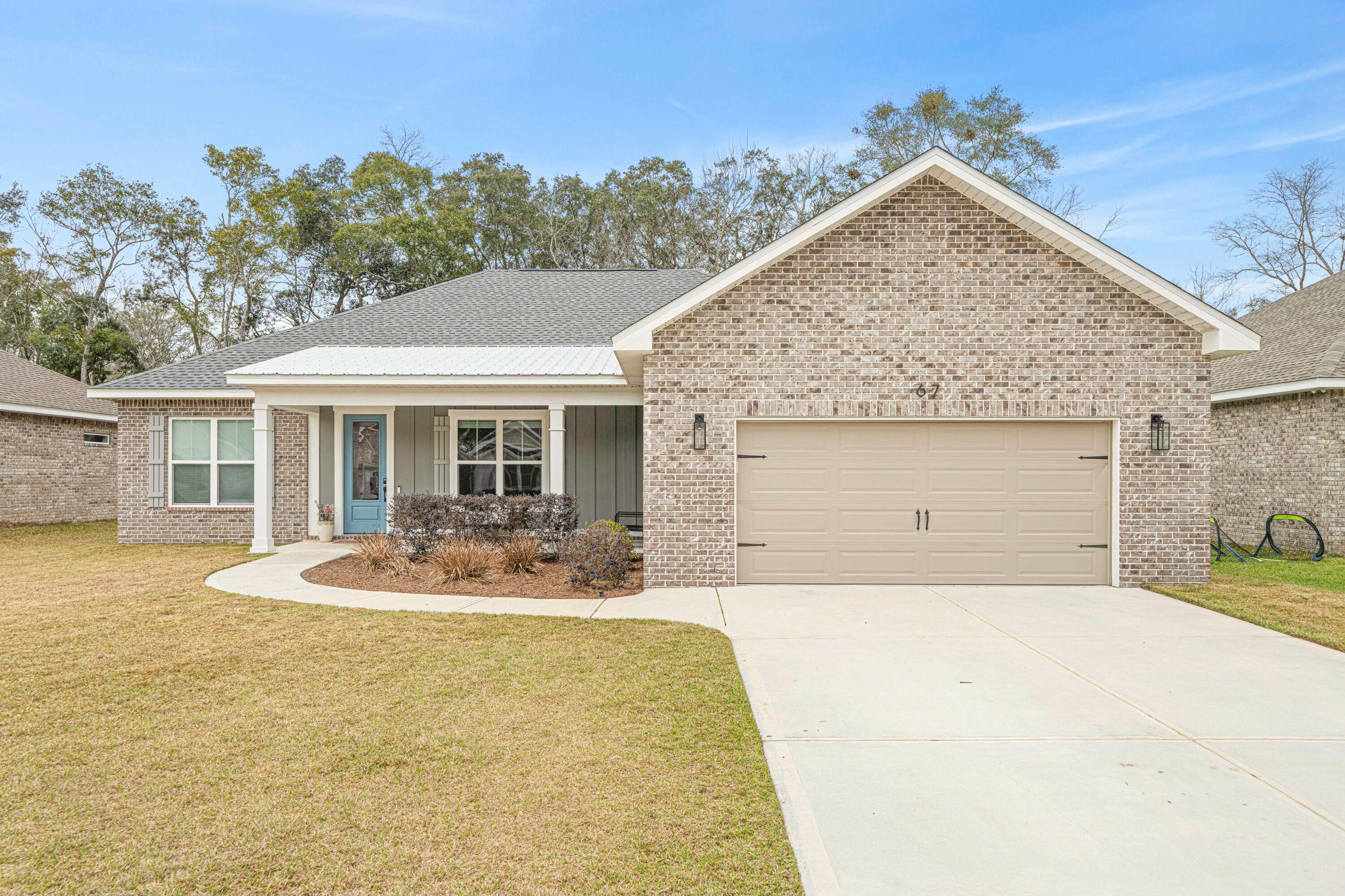 This beautifully crafted 4-bedroom, 2-bathroom home was built in 2023 with NO HOA FEES. With 2,144 square feet, this home combines modern amenities with classic Craftsman charm, offering a perfect blend of comfort and style.Prime Location: Situated just 4 miles from the Destin Mid-Bay Bridge Ramp and a mere block (.5 miles/ 1 minute drive) away from the Choctaw Beach boat ramp and park, this home is a haven for boating enthusiasts, families, and beach lovers alike. Modern Craftsmanship: Located on a newly developed road adorned exclusively with new homes, this property boasts underground utilities, ensuring a clean and unobstructed streetscape and peace of mind. Spacious Interiors: 3 of the 4 bedrooms feature walk-in closets, providing ample storage space. The beautiful master bathroom is designed with a zero-entry shower for ease and elegance.
Gourmet Kitchen: The kitchen is equipped with abundant cabinetry, a generous pantry, under cabinet lighting, and a modern-like new feel.
Elegant Touches: Enjoy the refined details of trey ceilings, wood accents, and crown molding throughout the home, adding a touch of sophistication to every room.
Outdoor Living: Both front and rear covered porches provide the perfect spaces to relax and enjoy the majestic feel that surrounds the property.
Bonus Offer: Take your new golf cart, included with the home, down to the park to enjoy Florida living.
Don't miss the opportunity to own this exceptional property that seamlessly blends modern conveniences with coastal charm.