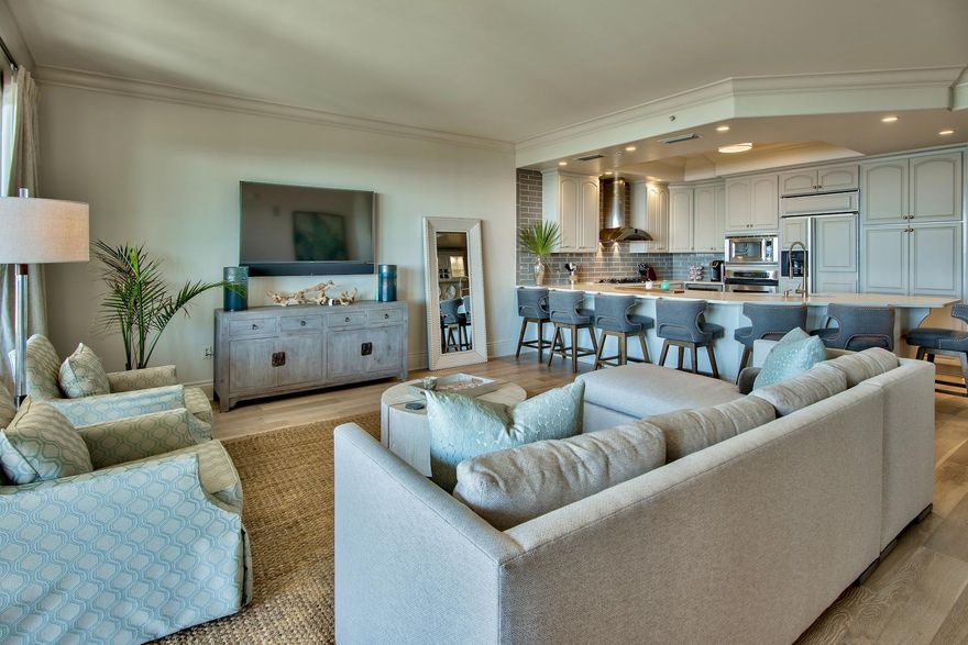 Experience unparalleled vistas and exceptional privacy from this non-rental 4 bedroom enclave located in the gated community of Avalon Dunes. Fresh paint and finely appointed custom finishes characterize this gulf front oasis. This unit also has a myriad of unique custom upgrades including a built-in wine bar, ice maker, Caesar Stone countertops, tiled showers and tubs, 8 foot solid wood doors, ceiling heights range from 9-10 feet and European waxed Oak pre-engineered hardwood flooring throughout. Located on the first level, which sits two floors above ground level, this unit features endless water views perfectly framed by arched accents presiding over the white sand beaches of the Gulf of Mexico.