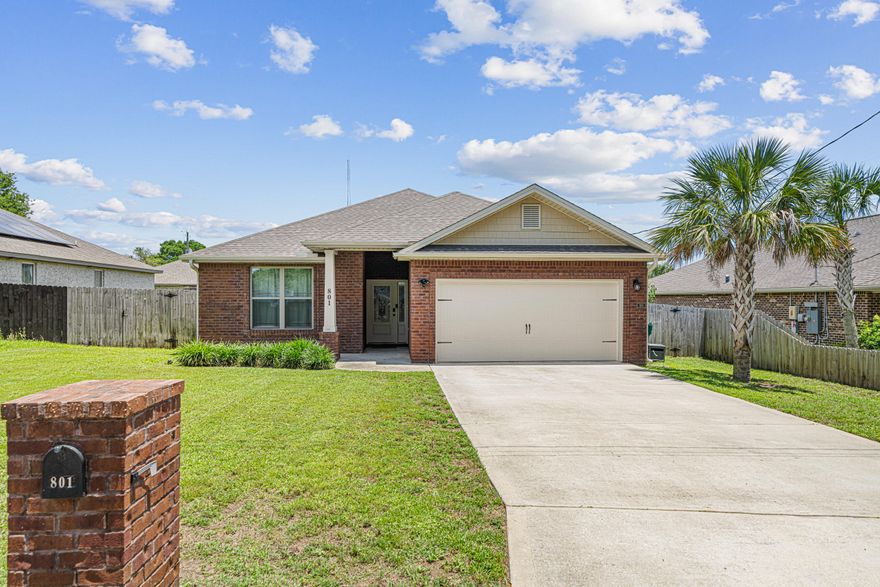 ****Eligible for a VA Assumption***Introducing 801 Playground Road - a nearly new residence offering modern design, quality finishes, and a thoughtfully crafted layout in the heart of Fort Walton Beach. This immaculate home features a spacious open floor plan, ideal for both everyday living and entertaining. The expansive kitchen boasts ample counter space, a generous pantry, and a central island that seamlessly connects to the main living area. Elegant ceiling trim lighting enhances the ambiance throughout the home, while the primary suite offers a true retreat with his and her walk-in closets and a spa-like master bathroom, complete with a large, walk-in shower. Meticulously maintained and move-in ready, this property provides the comfort of newer construction with the convenience of a prime location. Just minutes from military bases, local beaches, shopping, and dining. A rare opportunity to own a turnkey home in a desirable area schedule your private showing today.