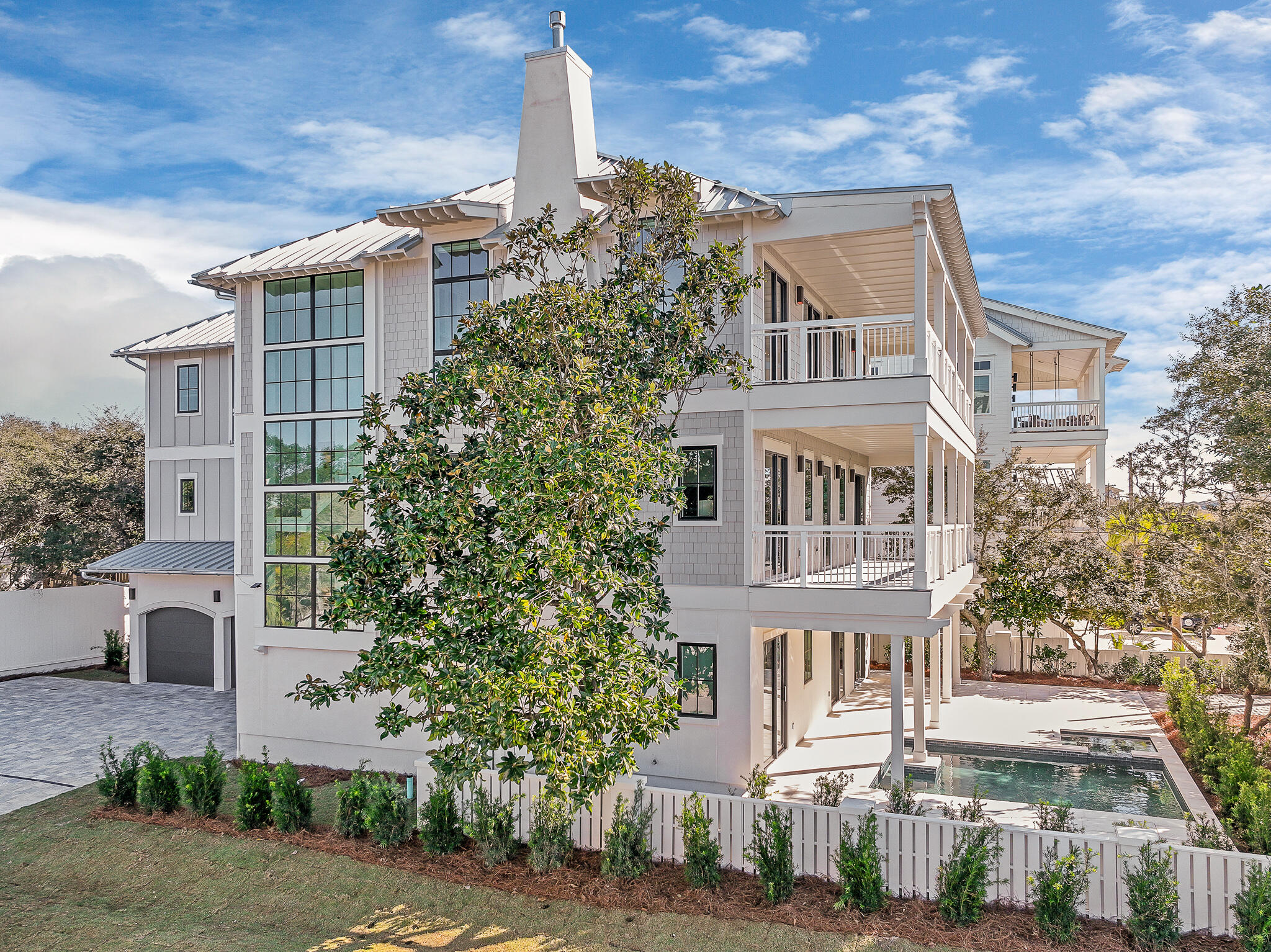 Sea Sunsets, the newest landmark home on renowned Scenic Highway 30A in South Walton, is an ode to the idyllic beach vacation getaway.  The home has been elegantly prepared and fully furnished by a professional interior design team.  Its light-filled space and thoughtful design embraces the beach from every vantage point, even while effortlessly handling the logistics of gatherings, privacy and vehicle parking.  An up-to-date take on a classic beach home design, its clean lines are defined by time-tested coastal architecture: high ceilings; cool, solid surface flooring; and plenty of outdoor space.  Sea Sunsets is built to standards of the latest construction science, elegant yet strong.  No feature or convenience was overlooked in the construction and design.